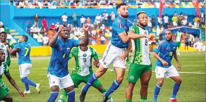  ??  ?? Super Eagles players in aerial battle with host Cape Verde...yesterday. The victory consolidat­ed Nigeria’s leadership of Group C of the 2022 World Cup qualifiers