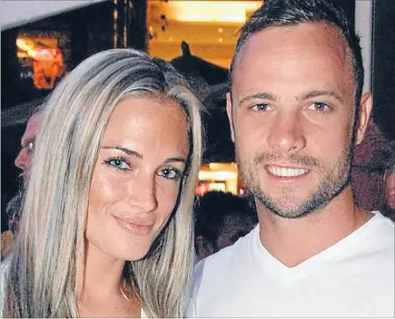  ?? Photo: GETTY IMAGES ?? On alert: Oscar Pistorius and his girlfriend Reeva Steencamp. The running star was yesterday charged with her murder.