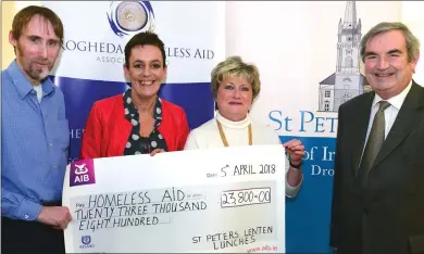  ??  ?? Pam and Clive Bagnall, organisers of the St. Peter’s Church of Ireland Lenten Lunches, present a cheque for 23,800 to Raymond Hughes and Maureen Ward of Drogheda Homeless Aid.