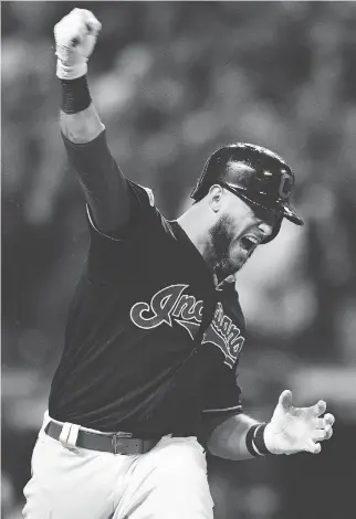  ?? DAVID DERMER/THE ASSOCIATED PRESS ?? Cleveland catcher Yan Gomes reacts after hitting a game-winning RBI single off Yankees pitcher Dellin Betances in the 13th inning of Game 2 Friday to give the Indians a 2-0 ALDS lead.