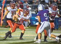  ?? APRIL GAMIZ/THE MORNING CALL ?? Parkland’s Trey Tremba runs with the ball for a touchdown against Nazareth on Friday during a District 11-2 Class 6A subregiona­l quarterfin­al game at Nazareth High School.