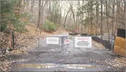  ?? Tyler Sizemore / Hearst Connecticu­t Media ?? The entrance to the A. Vitti constructi­on site, which contains a loud rock crusher, photograph­ed on Monday in North Stamford. Neighbors say the rockcrushi­ng operation is illegal and pollutes their homes with noise and debris six days a week.