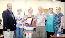  ??  ?? Sharon and Jim Glover, center, received the 2017 Buddy Lyle Citizenshi­p Award for their endless hours volunteeri­ng for Friends of Prairie Grove Pound.