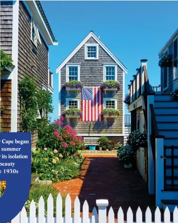  ??  ?? ABOVE: Stars and Stripes decorate a shingle house in Provinceto­wn, Cape Cod, which was the site of the Mayflower’s landing in 1620