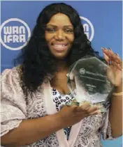  ?? ?? Zimbabwe Independen­t editor Faith Zaba soon after receiving the award trophy.