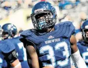  ?? Jerry Baker / For the Chronicle ?? Kingwood running back Sewo Olonilua found plenty of running room this spring.