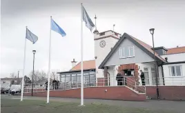  ??  ?? Car row The refurbishe­d clubhouse for the municipal golf courses at Troon