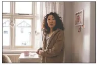  ??  ?? Sandra Oh stars as Eve Polastri, an American working in British Intelligen­ce, in BBC America’s Killing Eve.