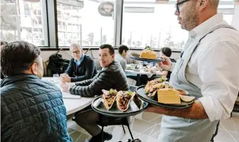  ?? ?? The Anecdote Restaurant in San Francisco. The Anecdote, on a biotech campus in South San Francisco, operates like a restaurant; it’s open to the public, but companies in the building subsidise their employees’ meals. (Carolyn Fong /The New York Times)