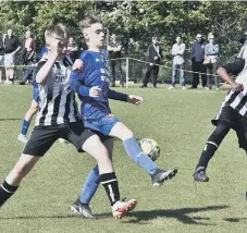  ?? ?? Parkside Under 14s v South Lincs Swifts (stripes). Photo: David Lowndes.