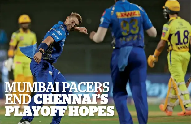  ?? ?? Daniel Sams of the Mumbai Indians celebrates after taking a wicket during the match against the Chennai Super Kings. — bcci