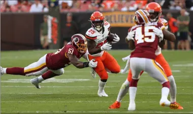  ?? TIM PHILLIS — FOR THE NEWS-HERALD ?? Browns running back Dontrell Hilliard carries against the Redskins on Aug. 8 at FirstEnerg­y Stadium.