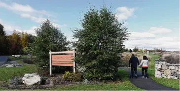  ?? Tyler Sizemore/Hearst Connecticu­t Media ?? Folks walk through Scofieldto­wn Park in Stamford on Oct. 22, 2023. Stamford’s Parks and Recreation Commission is considerin­g a dog park being added to Scofieldto­wn Park in North Stamford.