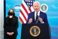  ?? The Associated Press ?? ■ President Joe Biden speaks during an event on COVID-19 vaccinatio­ns, in the South Court Auditorium on the White House campus on Monday in Washington, as Vice President Kamala Harris listens.