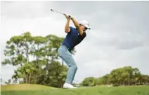  ?? BRENNAN ASPLEN/GETTY ?? Min Woo Lee, of Australia, plays a shot on the second hole during the third round of the Cognizant Classic on Saturday in Palm Beach Gardens.