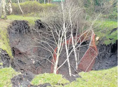  ??  ?? A sinkhole has appeared and grown to more than 20 feet wide in recent days in Y Felinheli