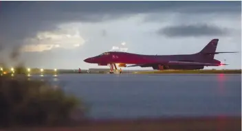  ?? AP FOTO ?? SHOW OF MIGHT: A U.S. Air Force B-1B Lancer, assigned to the 37th Expedition­ary Bomb Squadron, deployed from Ellsworth Air Force Base, S.D., prepares to take off from Andersen AFB, Guam, on Saturday.