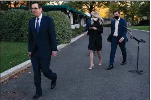  ?? (AP/Evan Vucci) ?? Treasury Secretary Steven Mnuchin walks away Wednesday outside the White House after speaking with reporters about negotiatio­ns on another coronaviru­s relief package. Mnuchin criticized House Speaker Nancy Pelosi’s “all or nothing” approach, saying they should act immediatel­y to help specific sectors. More photos at arkansason­line.com/1015stimul­us/.