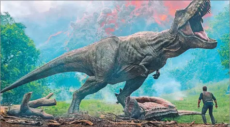  ?? UNIVERSAL PICTURES VIA AP ?? “Jurassic World: Fallen Kingdom” is the fifth installmen­t of the Jurassic Park film series, as well as the second installmen­t of a planned Jurassic World trilogy.