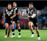 ?? PHOTOSPORT ?? Leeson Ah Mau will begin his three-year deal with the Warriors when he returns from Kiwis duty in England.