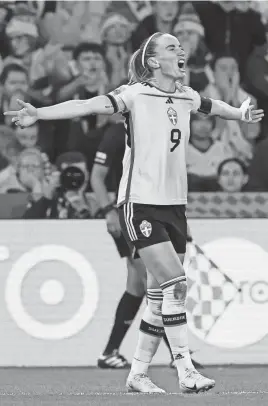  ?? TERTIUS PICKARD/AP ?? Sweden’s Kosovare Asllani celebrates after scoring her team’s second goal during the Women’s World Cup third-place match against Australia on Saturday in Brisbane, Australia.