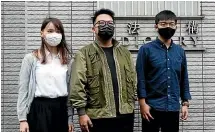  ?? AP ?? Activists, from right, Joshua Wong, Ivan Lam and Agnes Chow arrive at a court in Hong Kong.