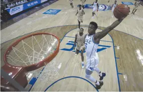  ?? CP FILE PHOTO ?? Duke’s RJ Barrett (5) goes up to dunk against Florida State during the NCAA college basketball championsh­ip game of the Atlantic Coast Conference tournament in Charlotte, N.C., on March 16.