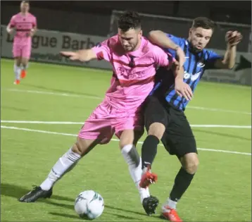  ??  ?? Thomas Croke, re-deployed as a right back under the new manager, tussling for possession in Athlone.