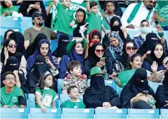  ??  ?? Saudi families sit in a stadium to attend an event in Riyadh commemorat­ing the anniversar­y of the founding of the kingdom.. — Reuters photo