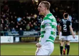  ??  ?? Celtic’s Leigh Griffiths celebrates his goal yesterday against Dundee