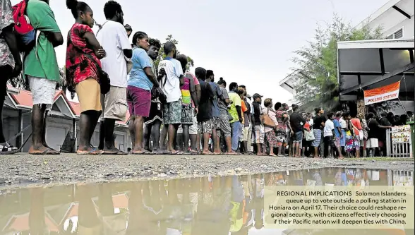  ?? ?? REGIONAL IMPLICATIO­NS Solomon Islanders queue up to vote outside a polling station in Honiara on April 17. Their choice could reshape regional security, with citizens effectivel­y choosing if their Pacific nation will deepen ties with China.