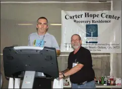  ?? TASHA BUNCH / Special ?? Gregg Ellis and Chuck Smith, founder and Director of Carter Hope Center