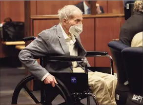  ?? Al Seib / Getty Images ?? Robert Durst, in his wheelchair, spins in place as he looks at people in an Inglewood, Calif., courtroom where he appeared with his attorneys for closing arguments presented by the prosecutio­n in Susan Berman’s murder trial on Sept. 8.
