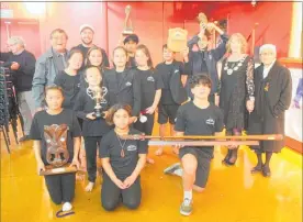  ??  ?? WHARETITI Kapa Haka Roopu with their community award and those won by Tararua College.