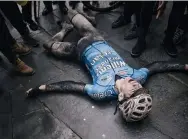  ??  ?? Wout Van Aert su fered cramp at the end, then collapsed after the inish line