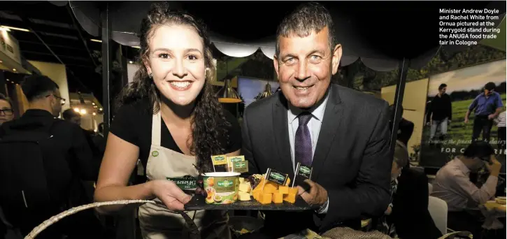  ??  ?? Minister Andrew Doyle and Rachel White from Ornua pictured at the Kerrygold stand during the ANUGA food trade fair in Cologne