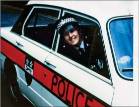  ?? ?? oN pAtRol: A smiling Jackie Malton in a Leicesters­hire police car in 1972