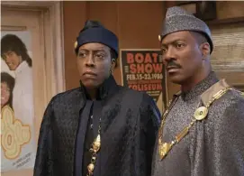  ??  ?? BACK IN NEW YORK: Arsenio Hall and Eddie Murphy, from left, reprise their roles as Semmi and Akeem in ‘Coming 2 America.’