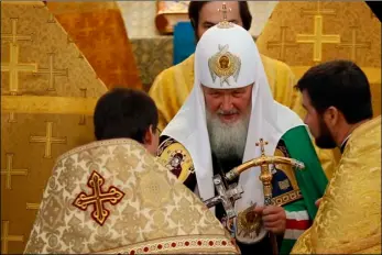  ??  ?? Russian Patriarch Kirill attends a blessing ceremony Sunday in the Saint Trinity Church on the banks of the Seine River, in Paris. AP PHOTO