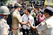  ?? PTI ?? Police detain a Maharashtr­a Navnirman Sena worker as per preventive action, at Khalkar Chowk in Pune, on Wednesday