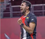  ??  ?? India's H S Prannoy reacts after his win against Indonesia's Jonatan Christie in the Thailand Open badminton tournament in Bangkok on Wednesday