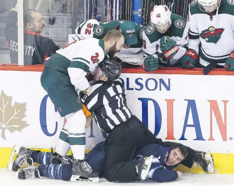  ?? JASON HALSTEAD/GETTY IMAGES ?? It hasn’t taken long for the animosity to build during the first-round playoff series between Winnipeg and Minnesota.