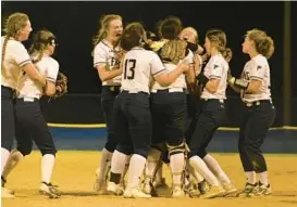  ?? BRIAN KRISTA/BALTIMORE SUN MEDIA ?? The Severna Park softball team celebrates its win Wednesday over South River in a Class 4A state semifinal at Bachman Sports Complex.