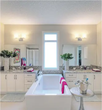  ?? PHOTOS: NUVISTA HOMES ?? This is the ensuite in the Avonley II by NuVista Homes.