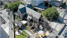  ??  ?? The three historic trees that could be felled during the Christ Church Cathedral restoratio­n work can be seen in the top left and right of this aerial view.