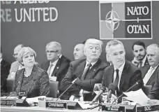  ?? MATT DUNHAM, AFP/GETTY IMAGES ?? From left, British Prime Minister Theresa May, President Trump and NATO Secretary General Jens Stoltenber­g in May.