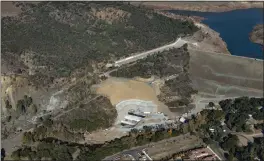  ?? ?? An aerial view taken Dec. 12 of a $168 million project to build a major new outlet tunnel at Anderson Dam near Morgan Hill.