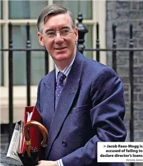  ?? Victoria Jones ?? > Jacob Rees-Mogg is
accused of failing to declare director’s loans