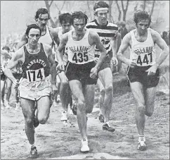  ?? ?? John Hartnett (centre) leading the IC4A cross country race in France in 1971. Villanova team-mate Donal Walsh is pictured right.