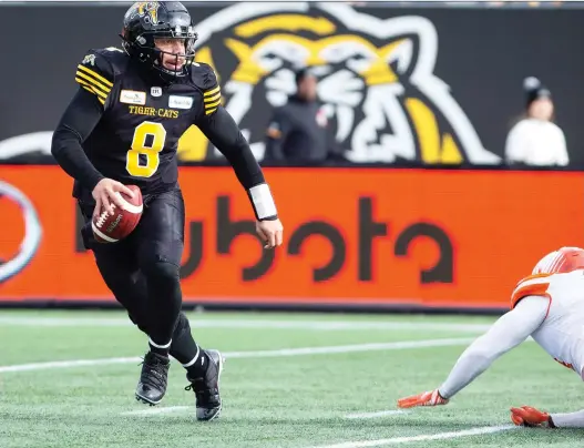  ??  ?? Hamilton Tiger-Cats quarterbac­k Jeremiah Masoli was near perfect Sunday in a 48-8 East Division semifinal win over the B.C. Lions at Tim Hortons Field. PETER POWER/THE CANADIAN PRESS